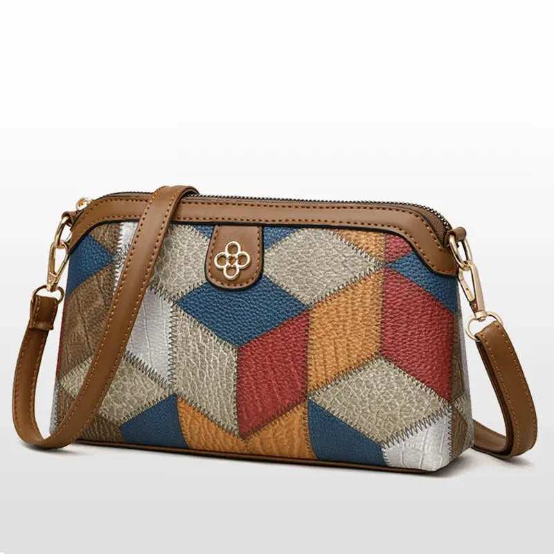 Crossbody bag by Simples Market in multicolor patchwork with brown leather trim