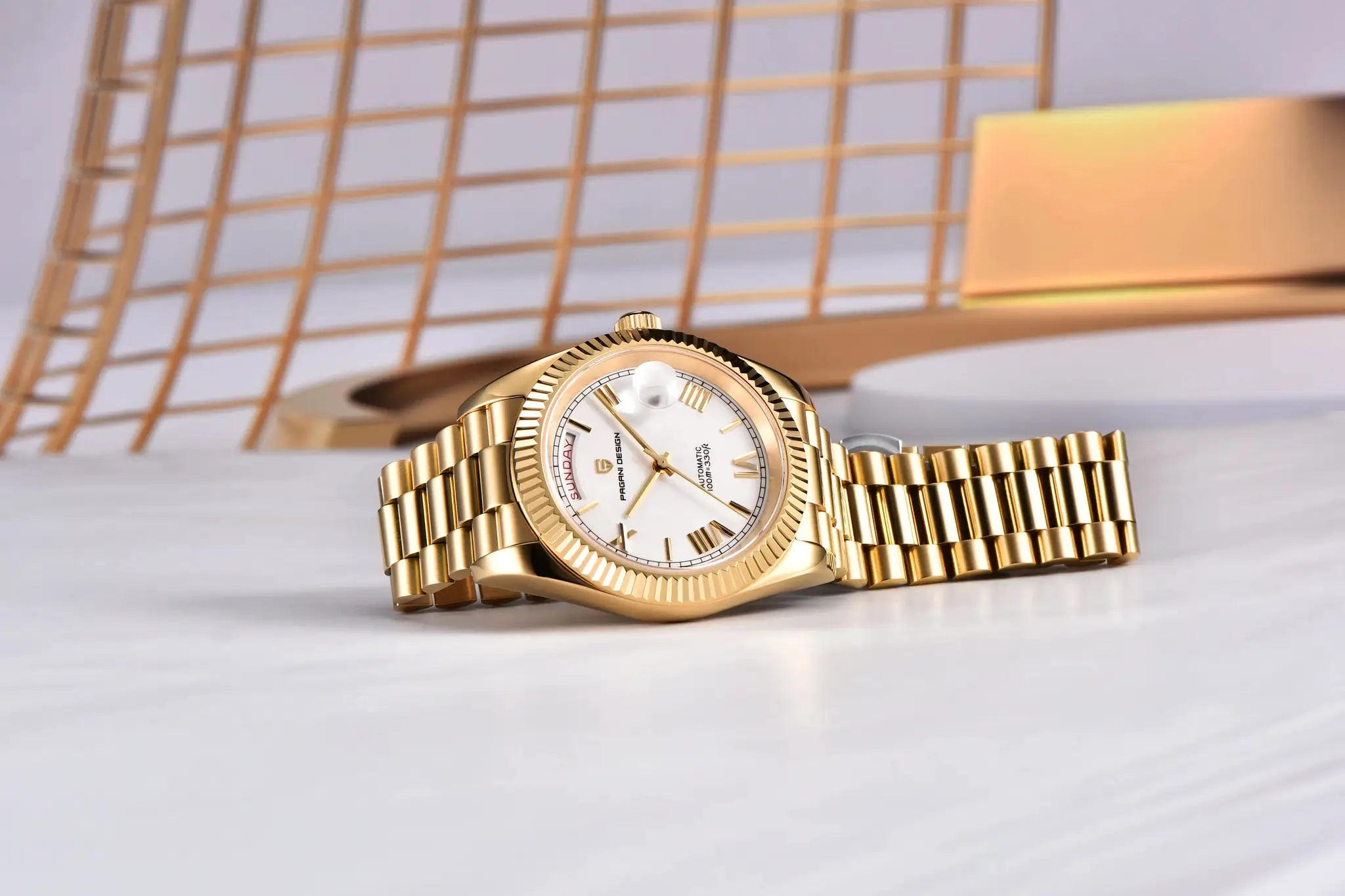Pagani Design men's gold-tone stainless steel watch with white dial, date window and day indicator