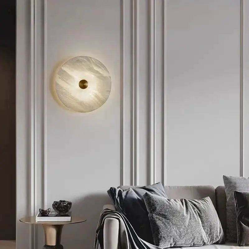 Luxury Spanish natural marble wall lamp, round disc with copper center, warm LED glow