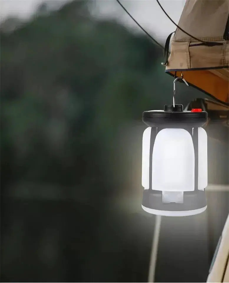 Outdoor LED camping lantern Simples Market, hanging from a tent, white glow, USB rechargeable, solar emergency light