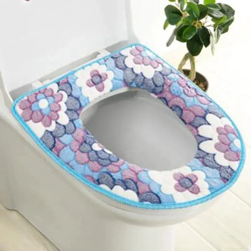 Plush toilet seat cover with blue floral pattern; waterproof, washable universal fit cushion
