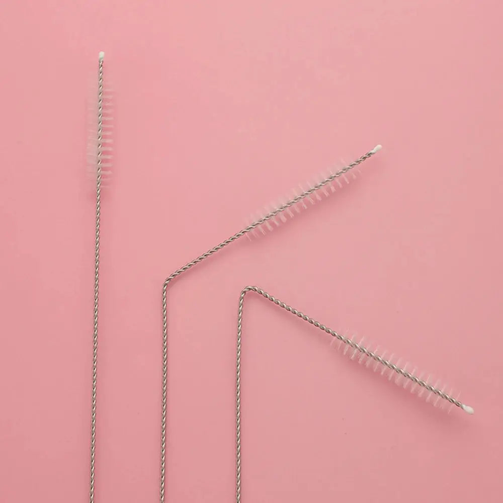 Set of four stainless steel cleaning brushes for straws and pipes; silver twisted handles with white bristles