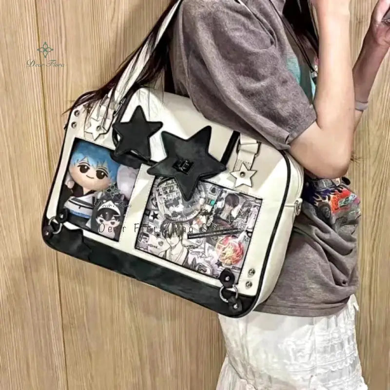 Y2K star ita bag by Simples Market, white with black star patches and transparent manga-panel pockets, crossbody purse