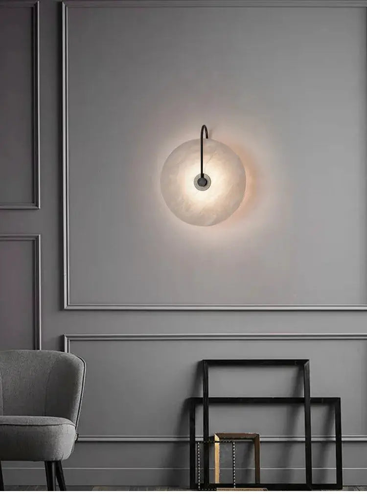 Nordic marble moon wall sconce with LED light, black cord, modern interior decor