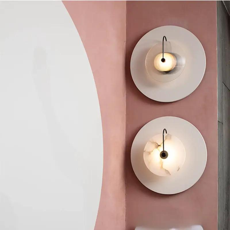 Nordic wall sconces pair with white circular plates and marble moon LED interiors, Simples Market.