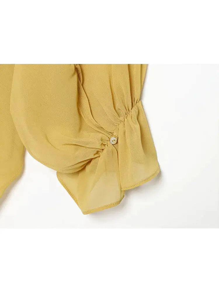 TFMLN women's mustard yellow sheer lantern-sleeve blouse with tie-side gathering and button detail