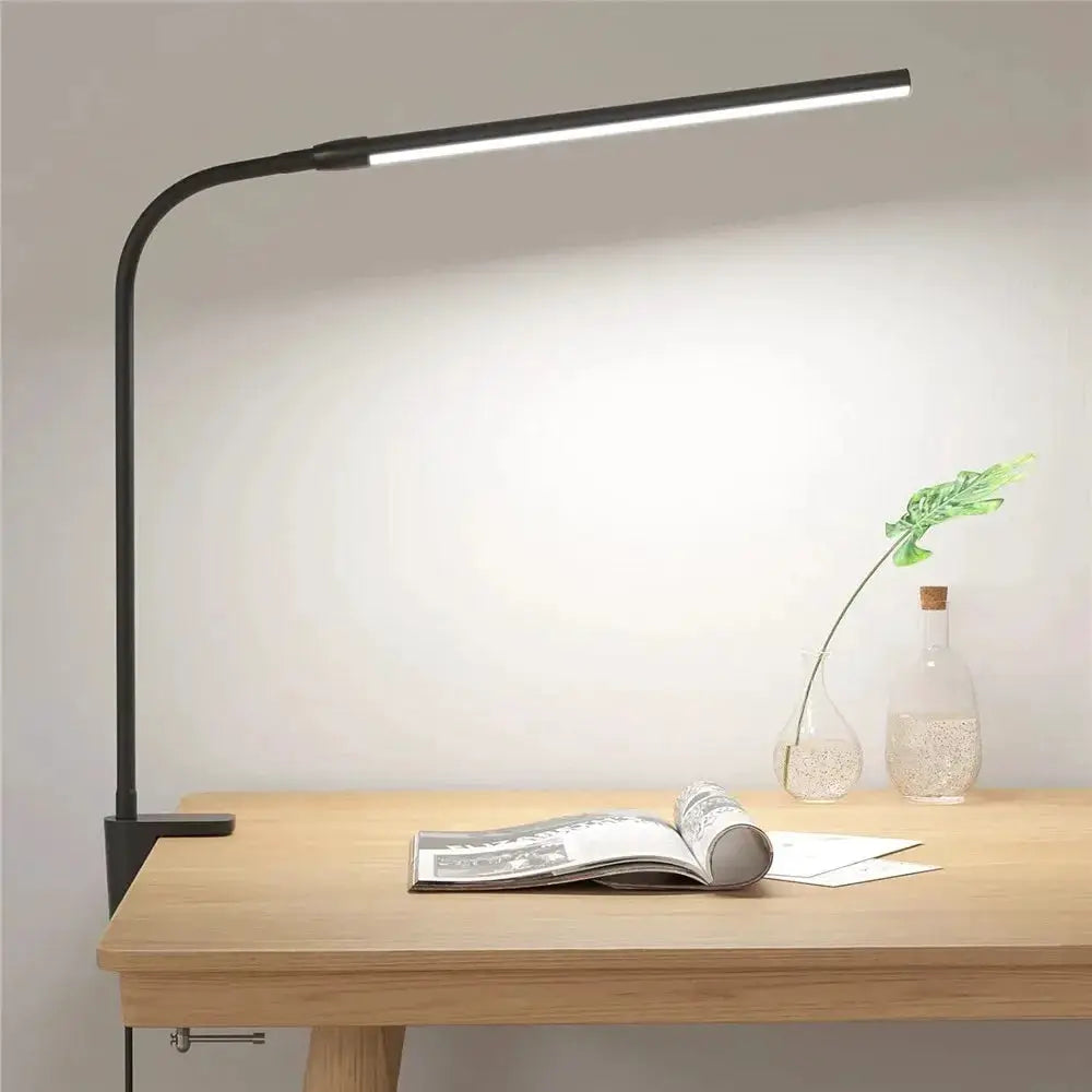 LED desk lamp with black gooseneck and slim LED bar, clamp-on base