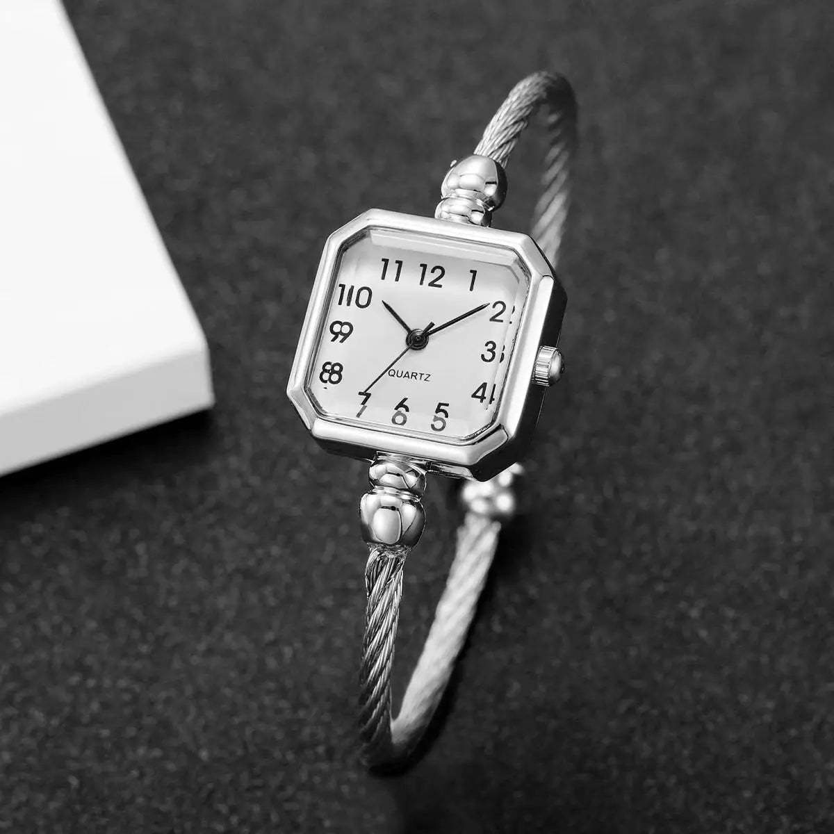 Women's square Roma dial quartz wristwatch with silver bracelet strap