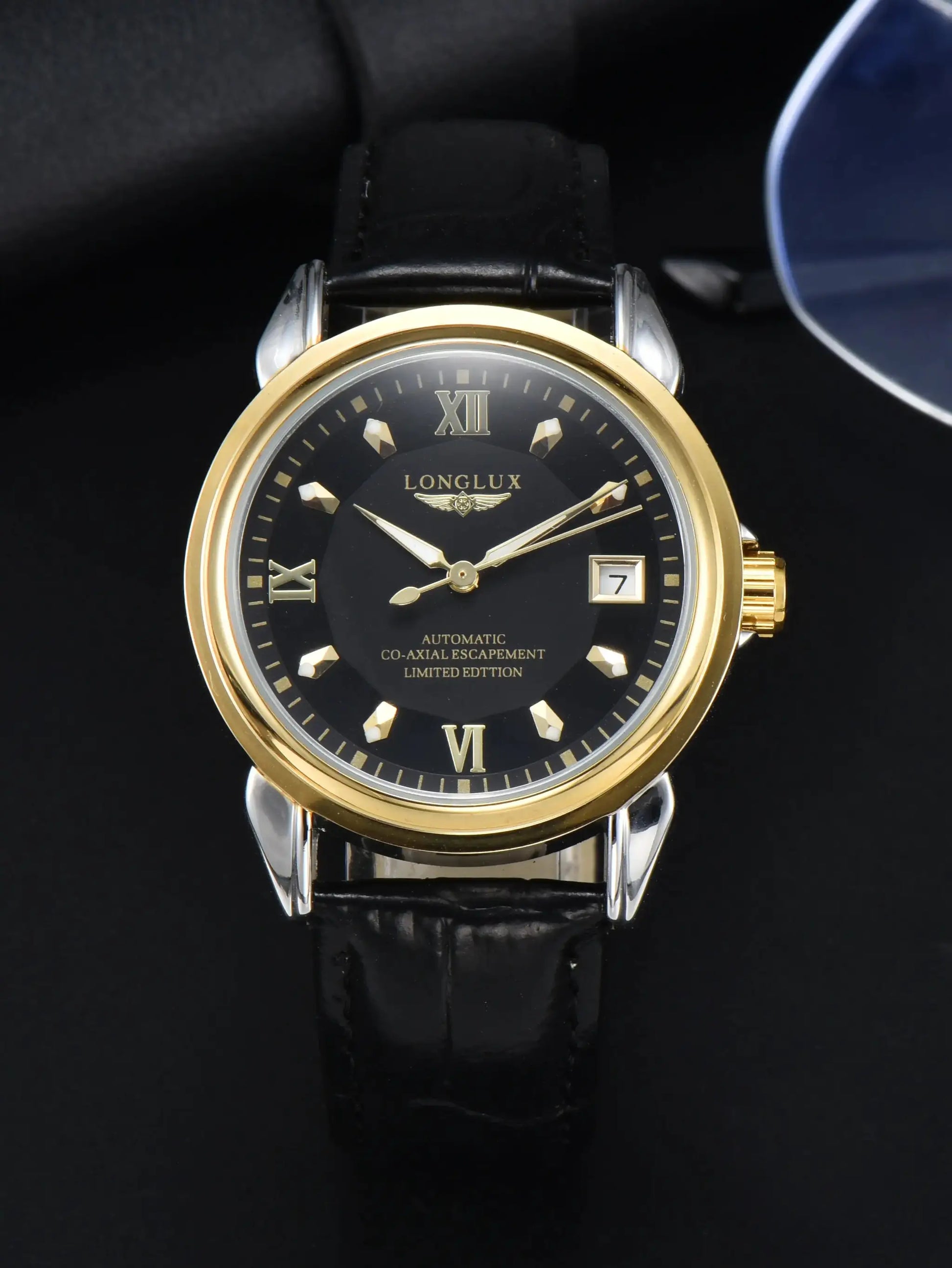 LONGLUX automatic men's watch with black dial, gold-tone bezel, leather strap and date window