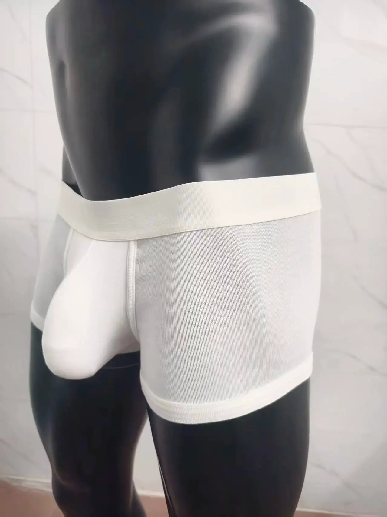 Cotton men's boxer briefs with a large front pocket in white, comfortable underwear.