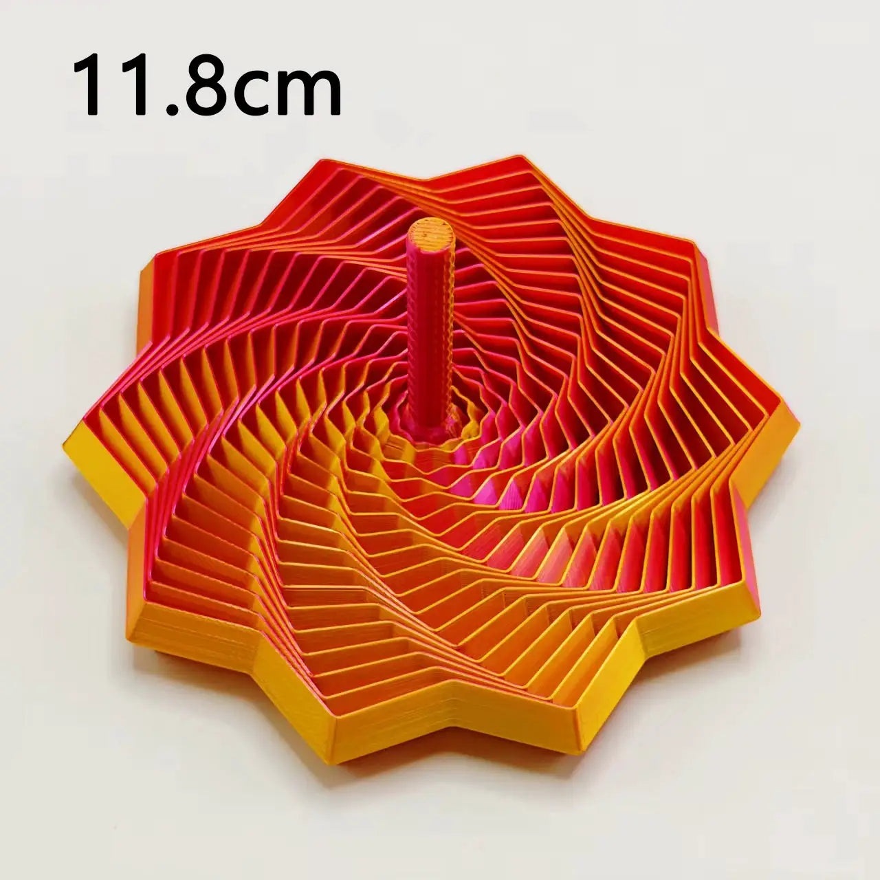 3D-printed sensory fidget star model with orange pink gradient and hexagon spiral design