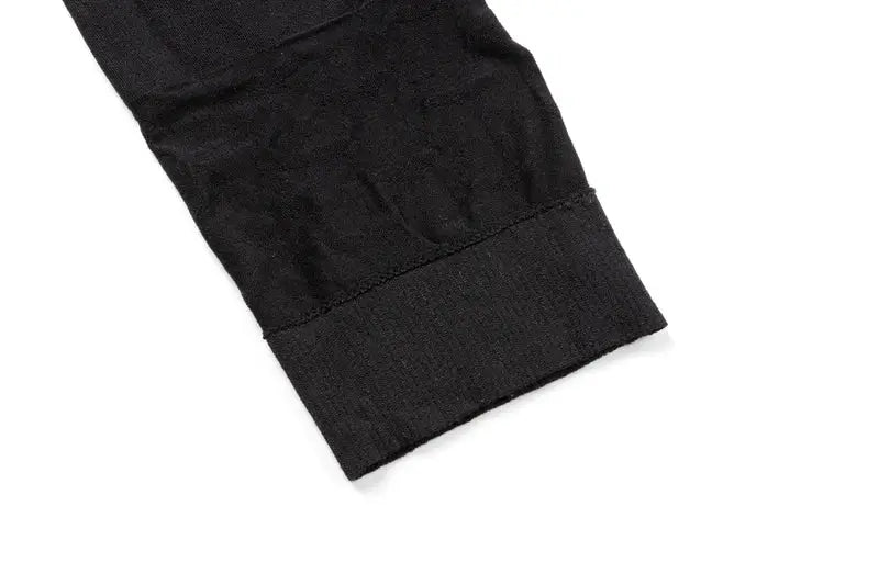 Men's black tummy control shapewear shorts with cuffed leg opening