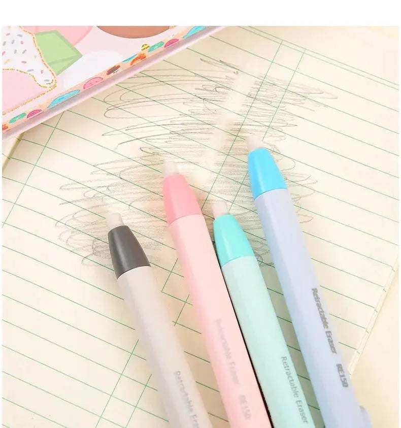 Set of four pastel retractable eraser pens with replaceable cores on a lined notebook