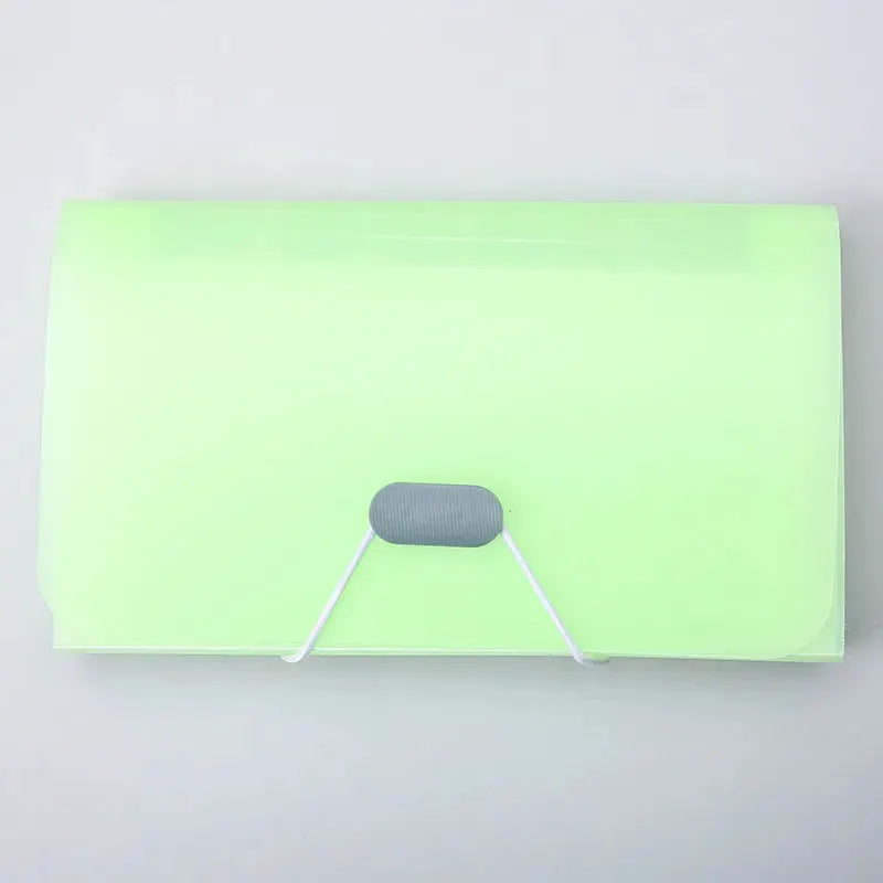 Neon lime green A6 expanding file folder with gray buckle and white elastic cord