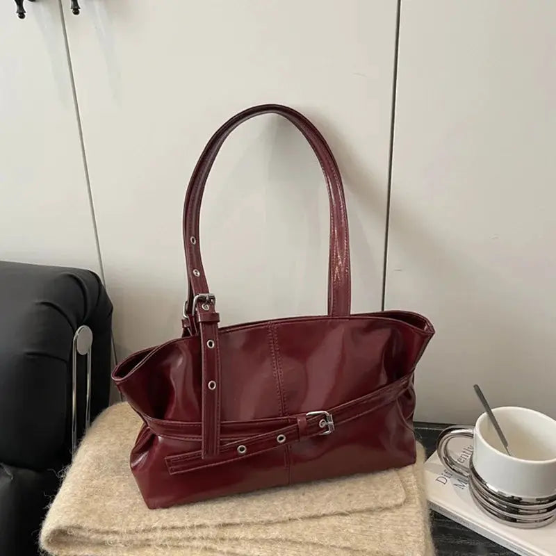 Simples Market burgundy soft leather handbag with belt buckle and top handles shoulder bag