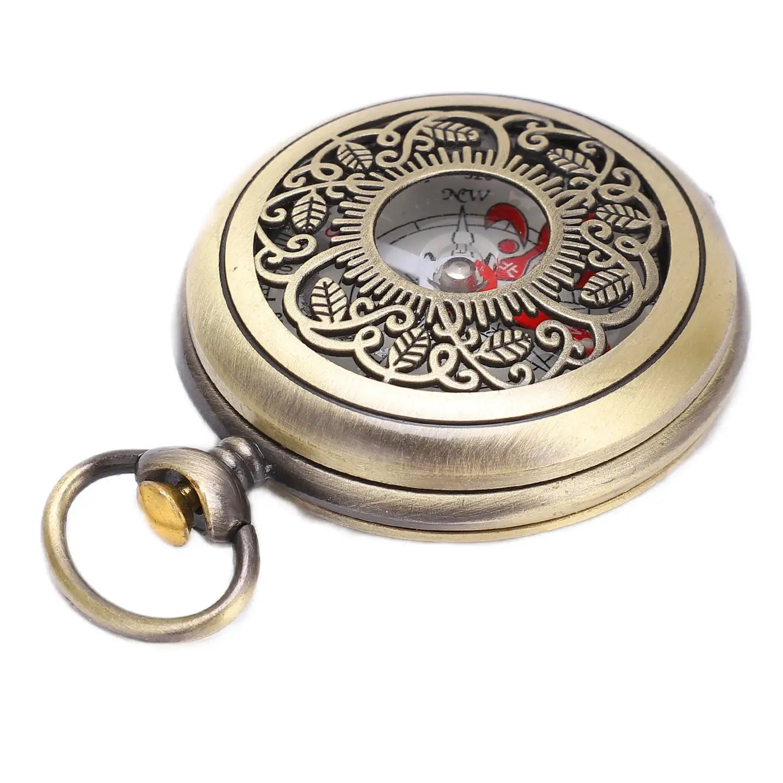Pocket compass made of brass with ornate gold-tone lid and leaf filigree, inner dial visible