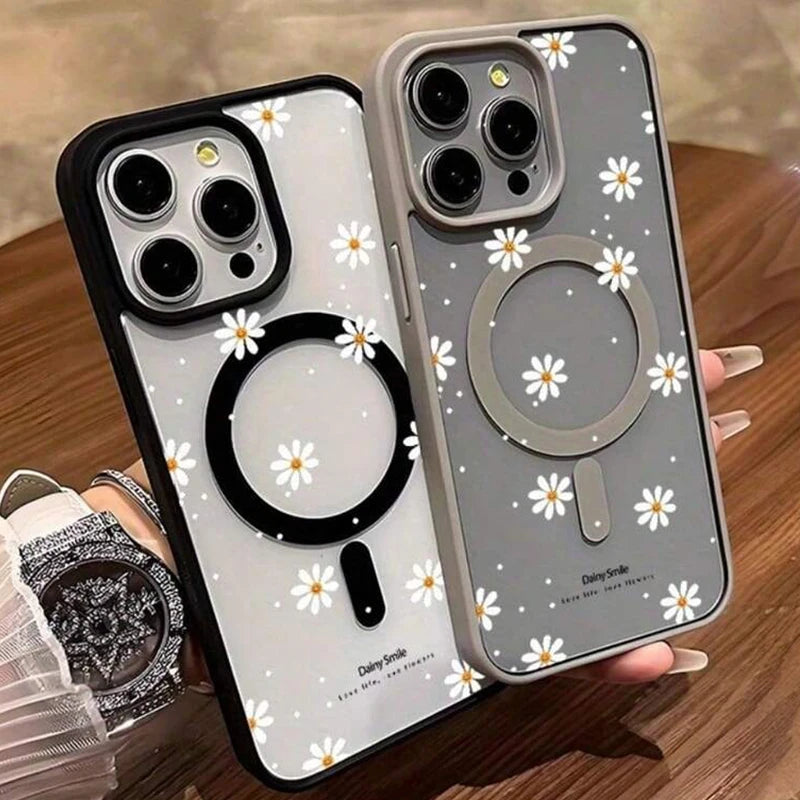 Two iPhone cases with white daisy pattern and circular magnetic ring stands for wireless charging.
