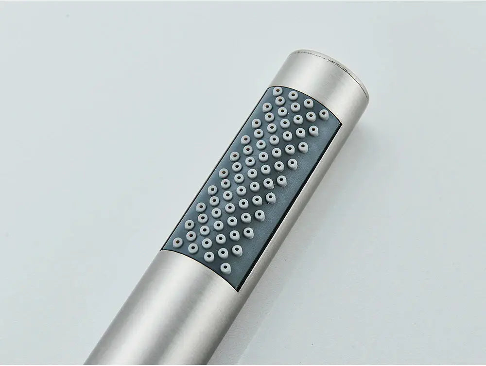 Handheld shower head with brushed silver finish and gray spray face with numerous small nozzles