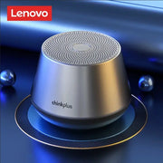 Lenovo thinkplus Bluetooth speaker, metallic silver cylindrical design with perforated top.