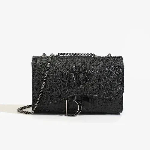 Crossbody handbag by Simples Market, black crocodile-embossed leather with silver chain strap and D logo clasp