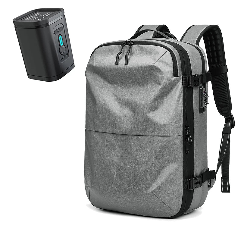 Grey men's travel backpack with vacuum compression for 17-inch laptop