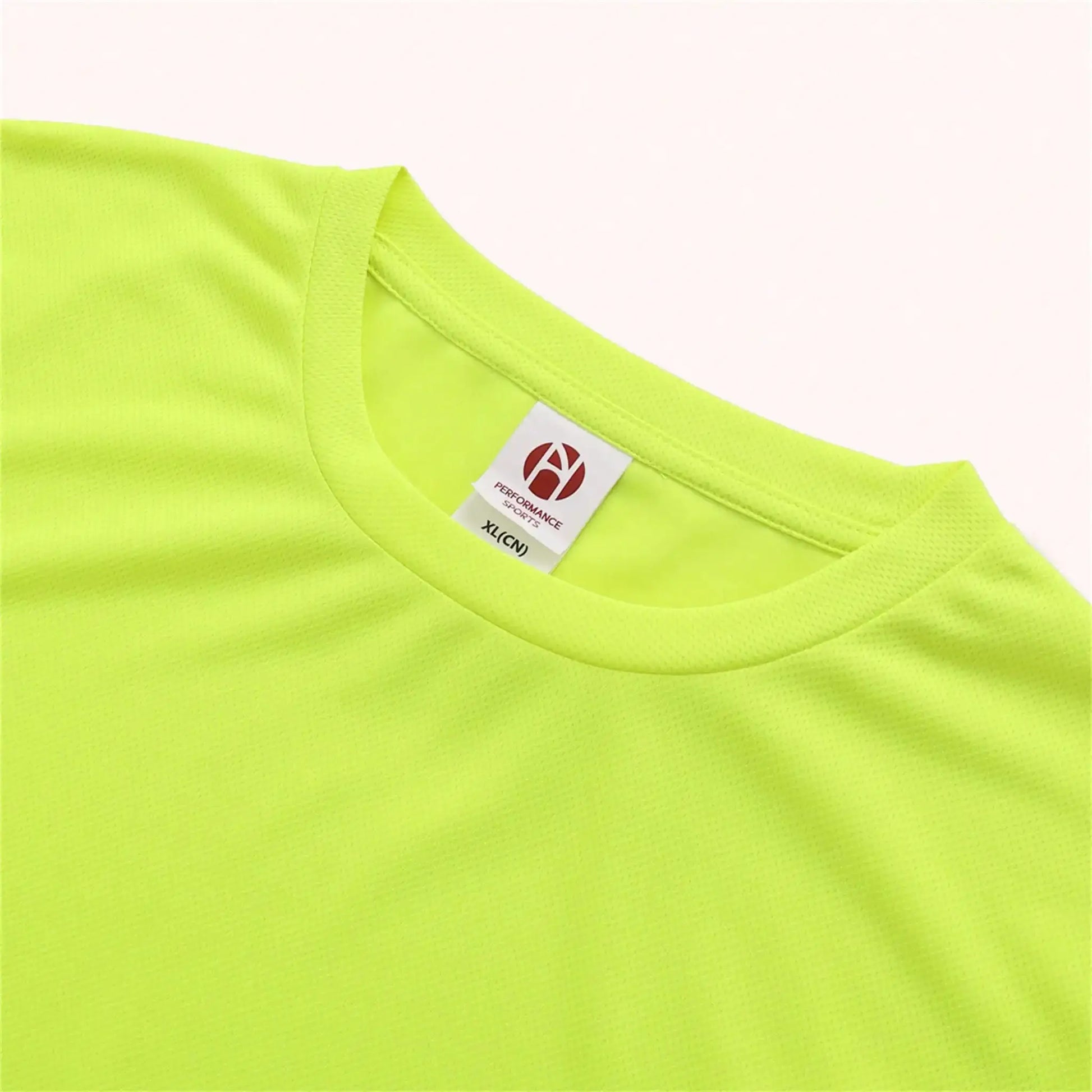 Men's performance long-sleeve athletic tee in neon yellow-green mesh fabric