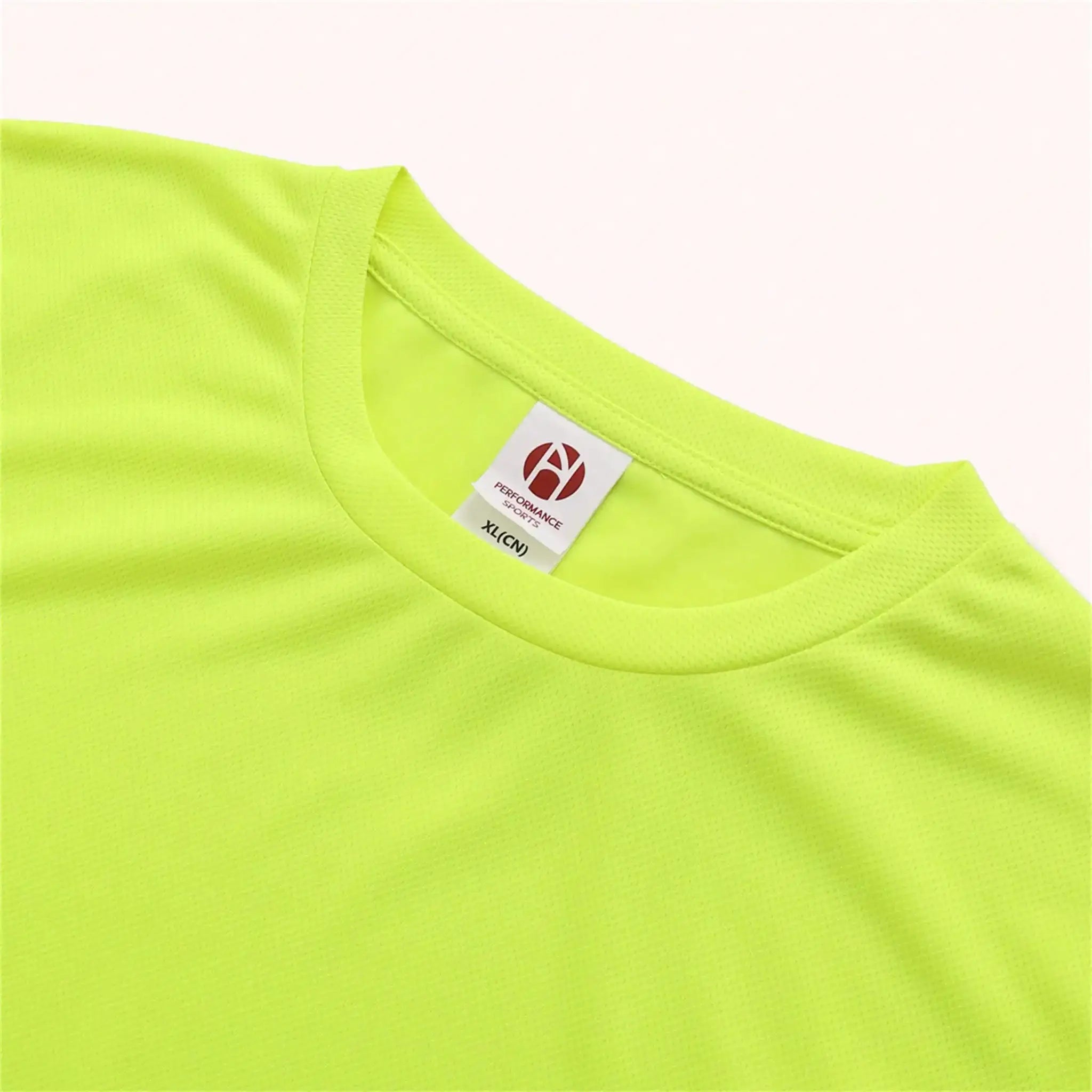 Men's performance long-sleeve athletic tee in neon yellow-green mesh fabric