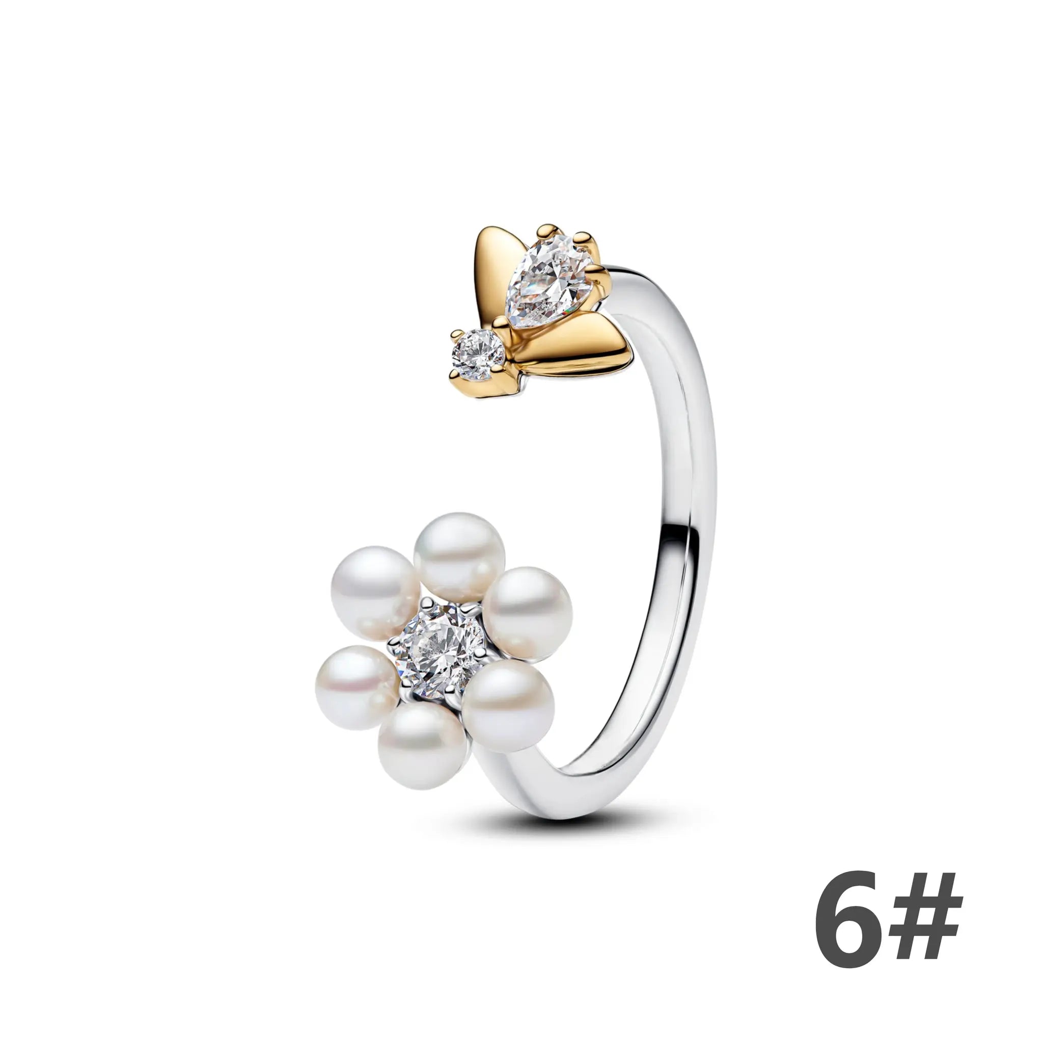 Sterling silver ring with gold butterfly accent, clear central gemstone and pearl cluster detailing