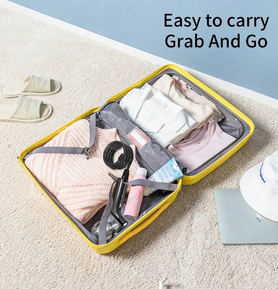 WOWER portable bidet handheld sprayer with 2m hose, Simples Market; compact travel kit in a yellow suitcase