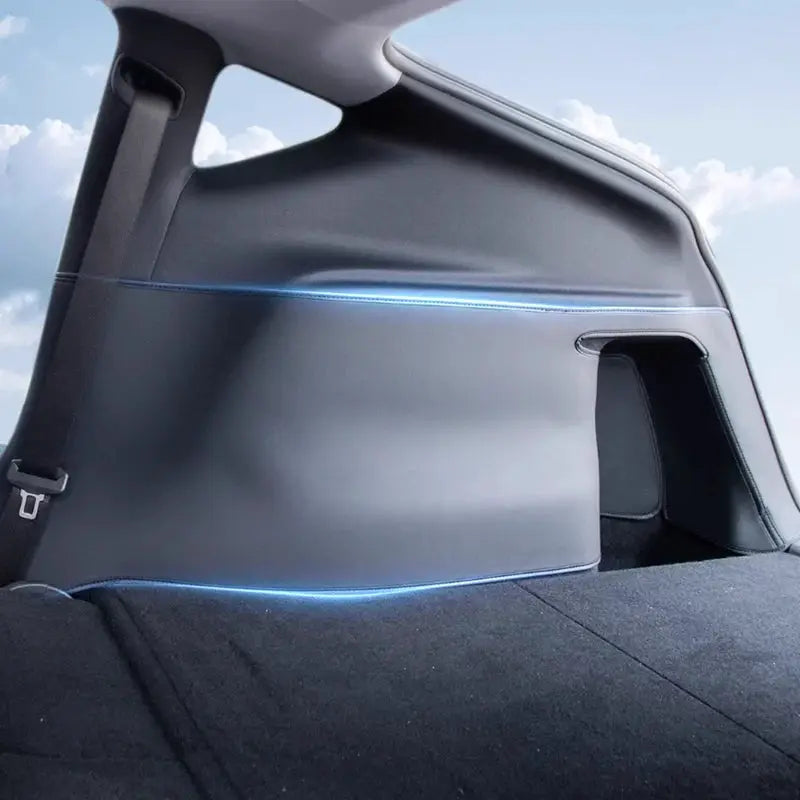 Simples Market Juniper trunk mat for Tesla Model Y; full-coverage cargo liner with side guards, black with blue trim.