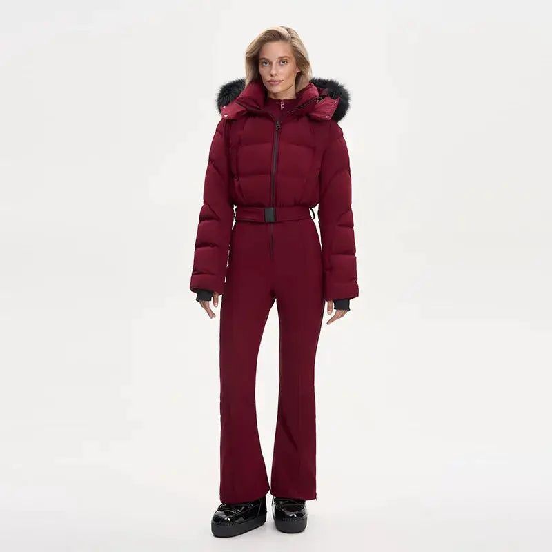 Thicken one-piece ski suit for women by Simples Market in burgundy with faux fur hood and waist belt