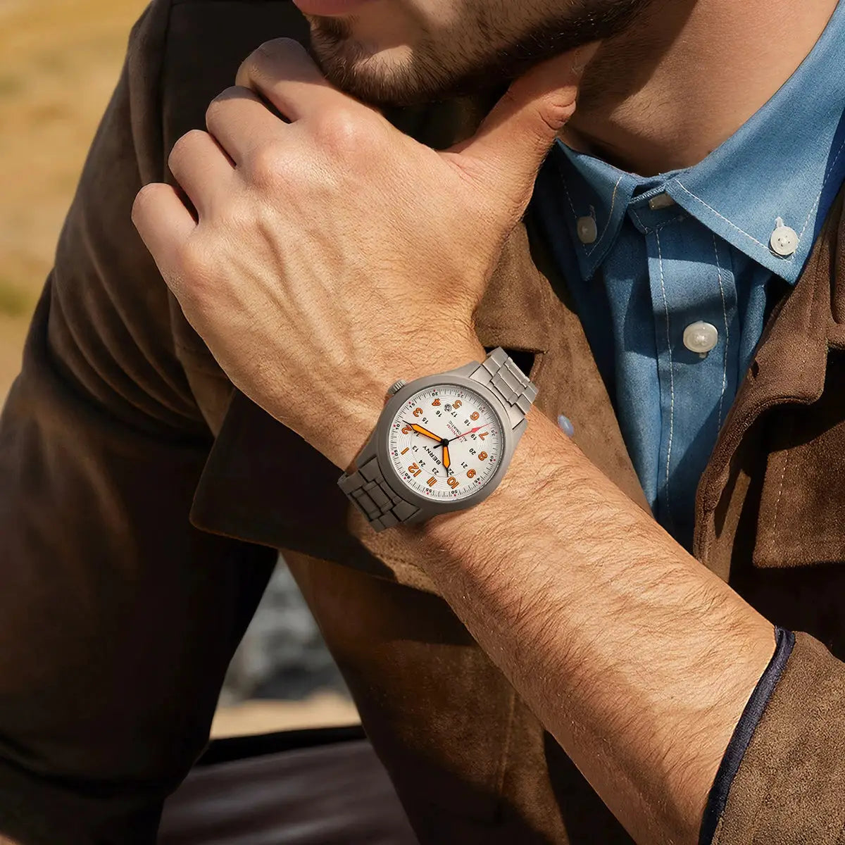 BERNY titanium automatic men's watch with white dial, orange numerals, and silver bracelet.