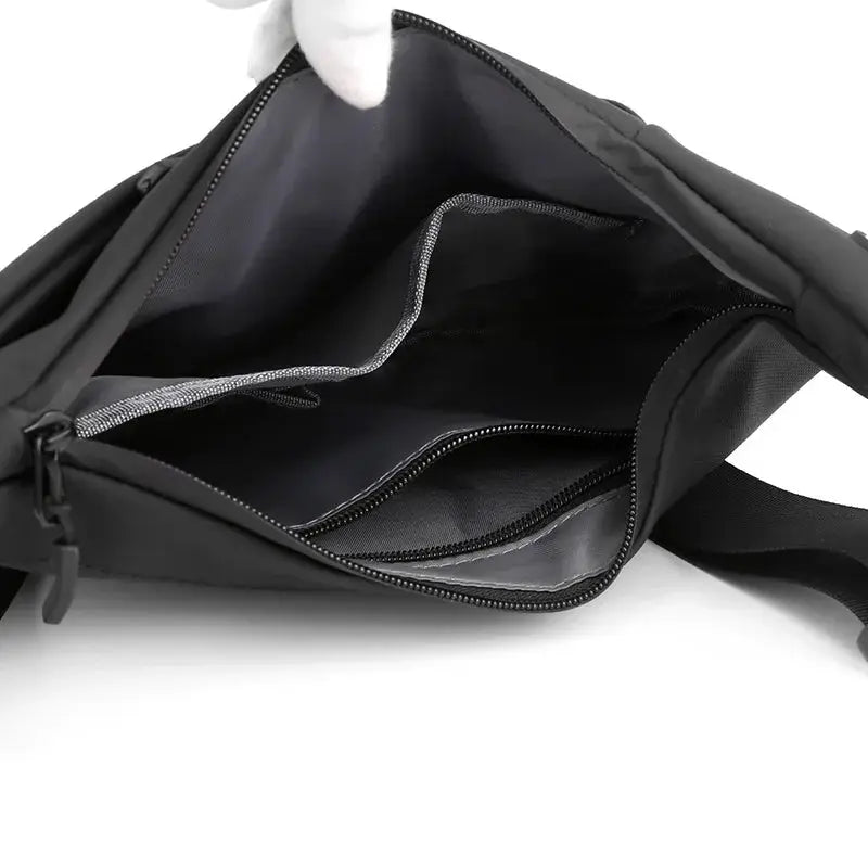 Simples Market black sling chest bag for men, compact crossbody messenger with multiple zip pockets.
