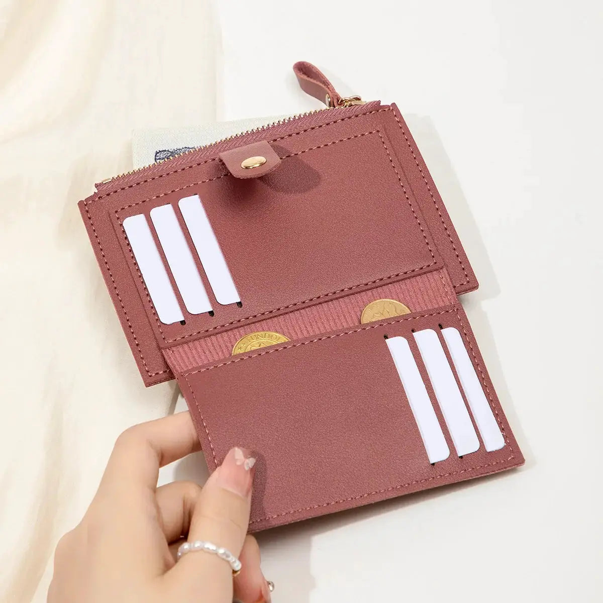Minimalist women's pink PU leather short card wallet by Simples Market with card slots