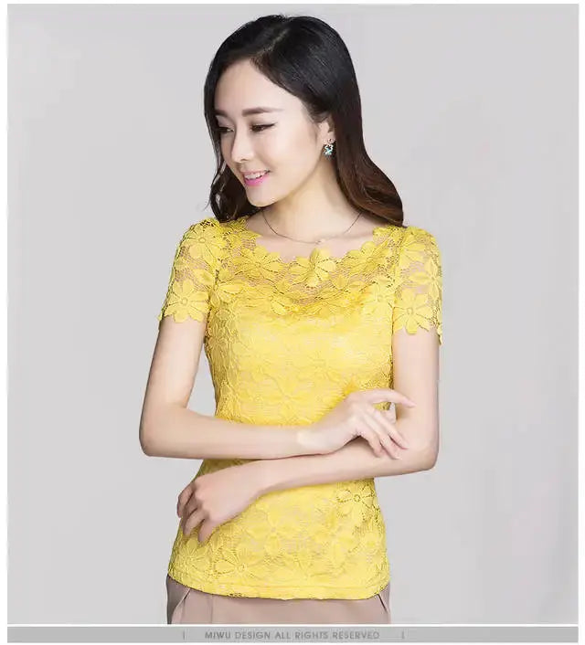Summer lace blouse for women in yellow with floral lace and short sleeves.