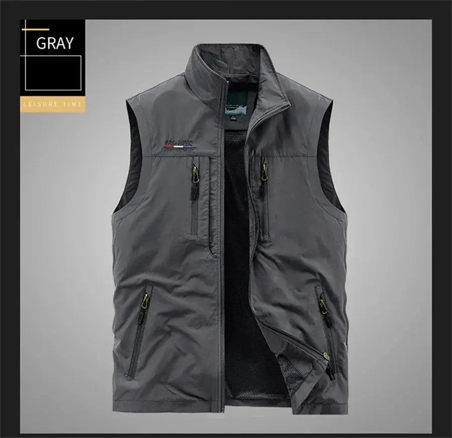 Gray men's sleeveless cargo vest with multiple zip pockets and high collar for outdoor activities