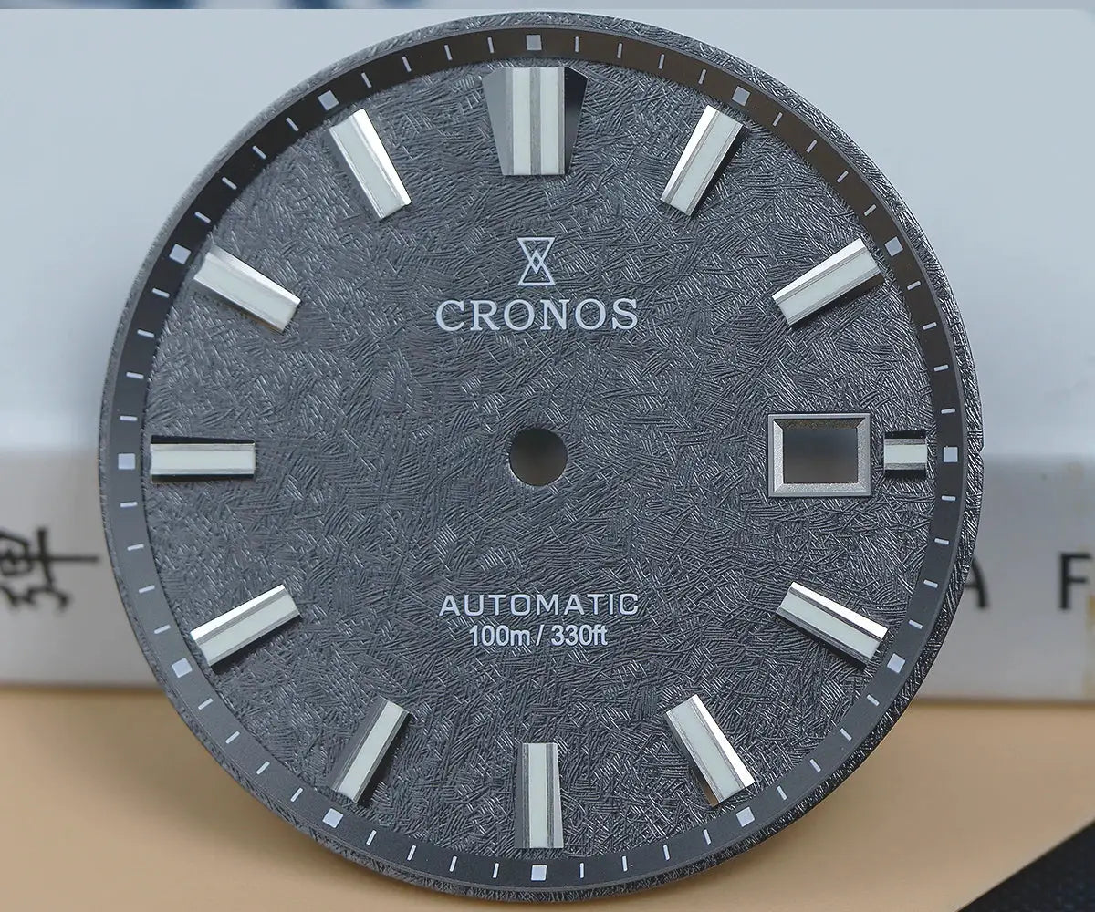 Cronos men's watch dial with birch-pattern textured gray surface, automatic movement, 3 o'clock date window