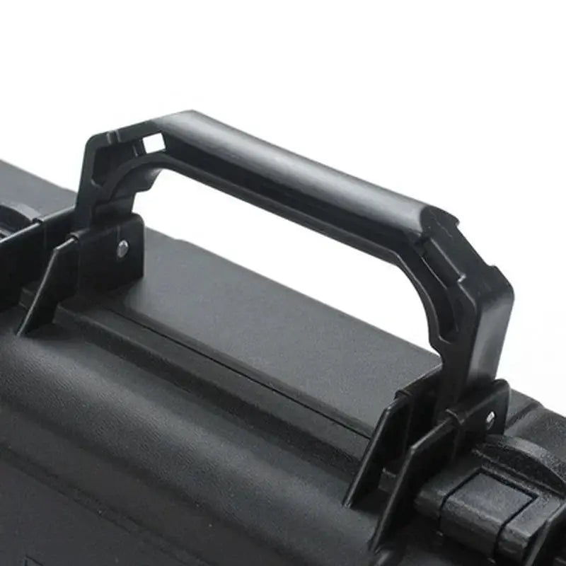 Black hard tool case with ergonomic carrying handle and secure latch closures