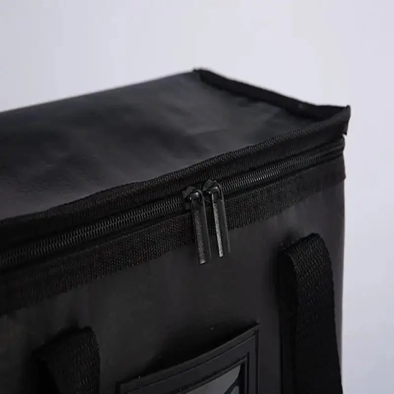 Portable large insulated food delivery bag, black with a double-zipper top and carrying handles