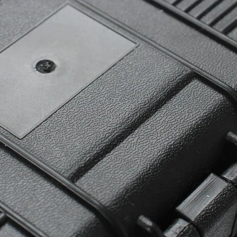 Waterproof hard tool case with black textured exterior for tools and camera gear