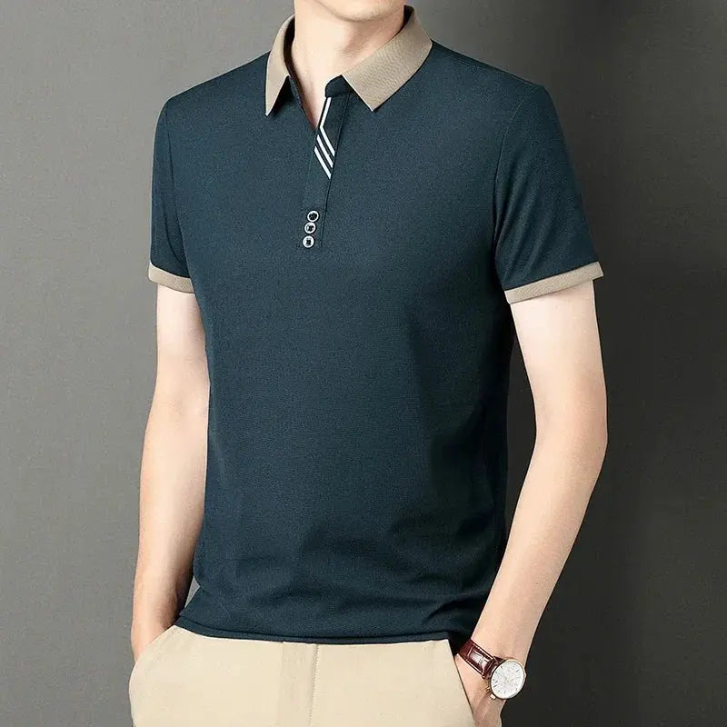 Men's Simples Market polo shirt, solid dark teal with beige collar and cuffs, short sleeves.
