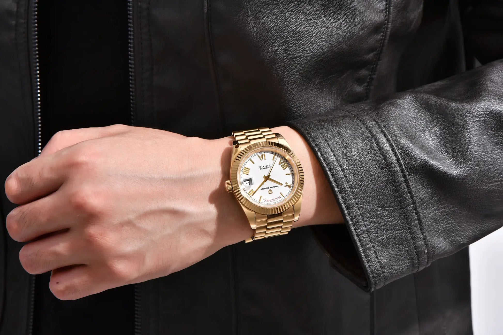 Pagani Design men's gold-tone watch with white dial and date window on a gold bracelet.