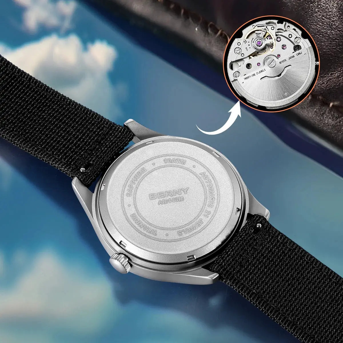 BERNY titanium automatic men's watch with black fabric strap and metal case back, featuring exposed movement.