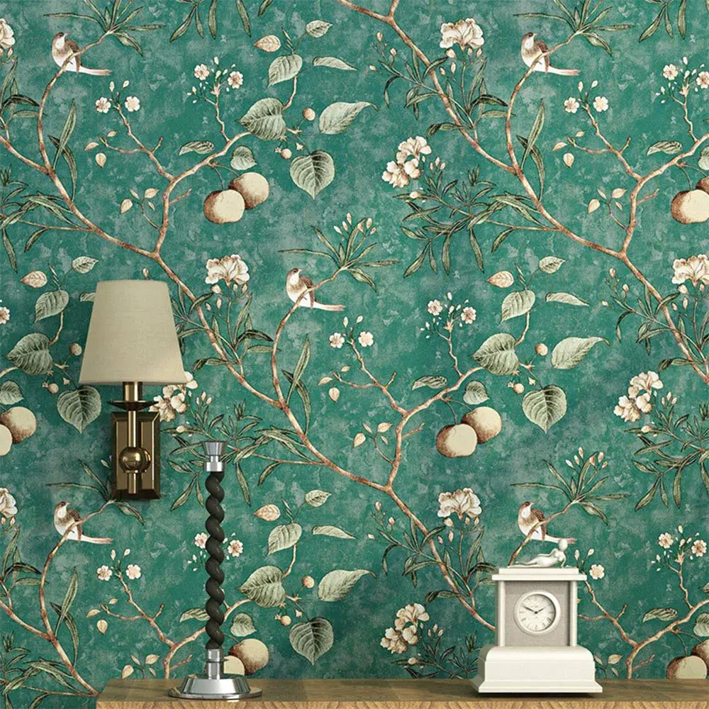 Peel-and-stick floral wallpaper in teal with branches, blossoms and birds; self-adhesive and waterproof.