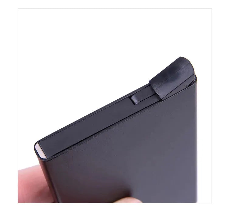 RFID card holder, slim black metal wallet with pop-up design by Simples Market.