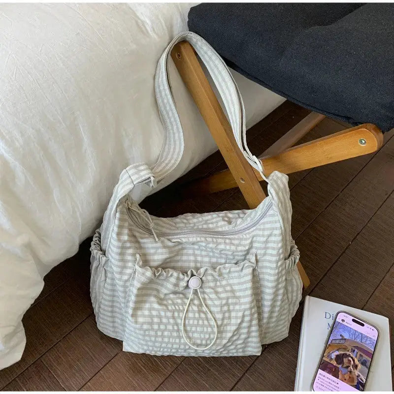 Korean nylon shoulder bag by Simples Market, light gray plaid with front drawstring pocket and dual straps