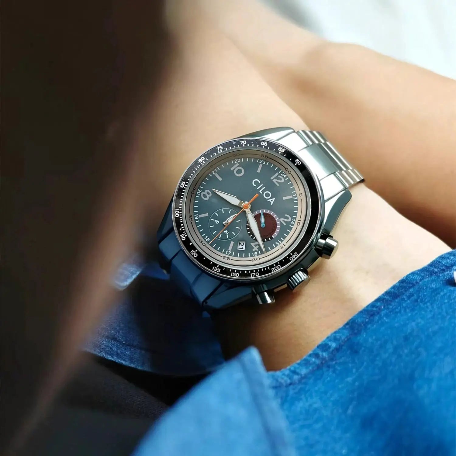 CILOA men's stainless steel waterproof quartz watch with blue dial and chronograph subdials on a metal bracelet