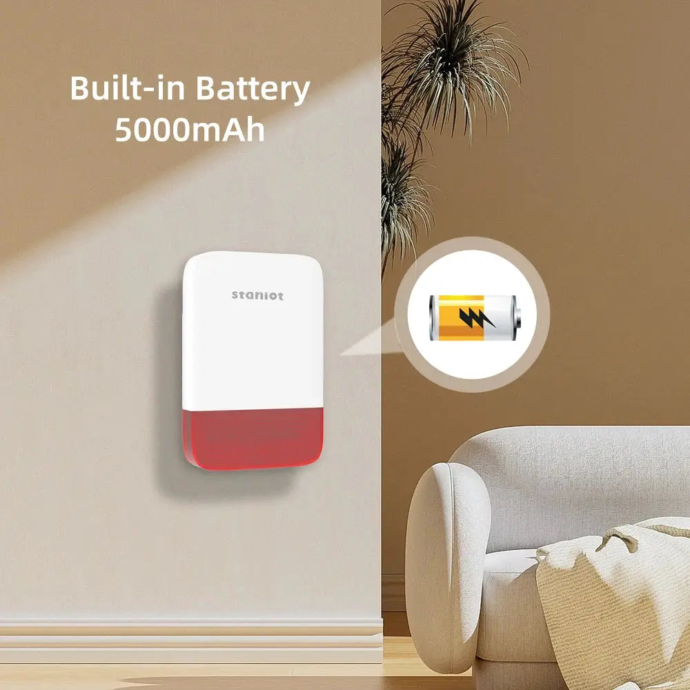 Staniot wireless strobe siren mounted on wall, white with red base and 5000mAh built-in battery.