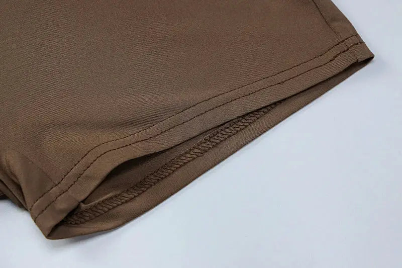 Hugcitar long-sleeve playsuit brown sleeve hem with double-stitched edge