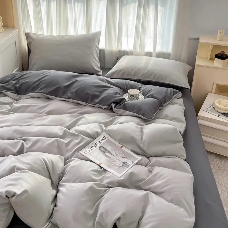 4-piece bed set by Simples Market in 2-side solid color brush fabric with gray duvet cover and pillowcases.